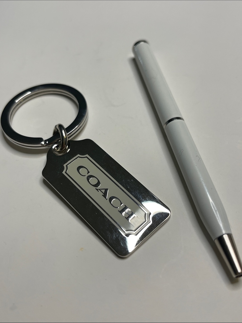 Coach Silver Rectangular Logo Tag Keychain and Coach Pen - Picture 2 of 6